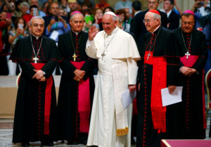 Pope Francis waves as he arrives to attend the opening of the Diocese of Rome's annual pastoral conference at the Basilica of St. John Lateran in Rome June 16. Also pictured is Cardinal Agostino Vallini, papal vicar for Rome. (CNS photo/Tony Gentile, Reuters) 