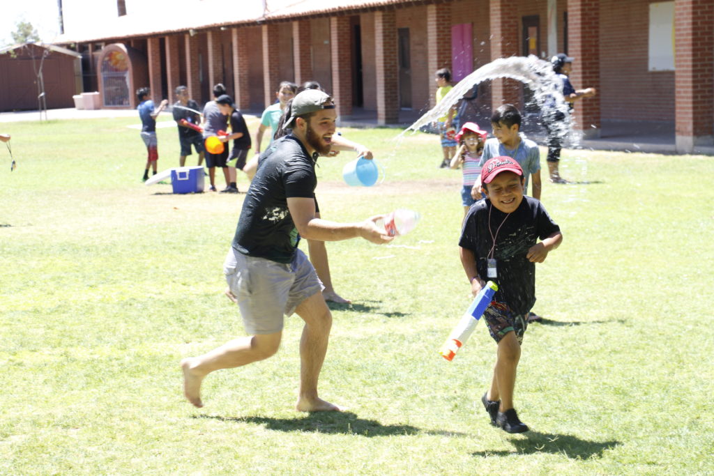 Noah Minton, a seminarian for the Diocese of Phoenix, participates in a Water Day that concluded the Totus Tuus Camp at Most Holy Trinity June 17. (Ambria Hammel/CATHOLIC SUN)