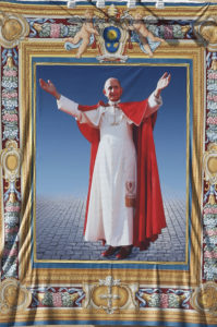 A tapestry of Blessed Paul VI hangs from the facade of St. Peter's Basilica during his beatification Mass celebrated by Pope Francis in St. Peter's Square at the Vatican Oct. 19, 2014. The Mass also concluded the extraordinary Synod of Bishops on the family. Blessed Paul, who served as pope from 1963-1978, is most remembered for his 1968 encyclical, "Humanae Vitae," which affirmed the church's teaching against artificial contraception. (Paul Haring/CNS)