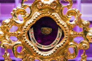 A relic of St. John Paul II stands in the chapel of the Victor's Residenz Margarethenhof nursing home May 18 in Laatzen, Germany. The relic contains hair from St. John Paul II that was given to the nursing home director Adrian Grandt in Poland. It will remain behind bulletproof glass on display in front of the altar. (CNS photo/Sebastain Gollnow, EPA)