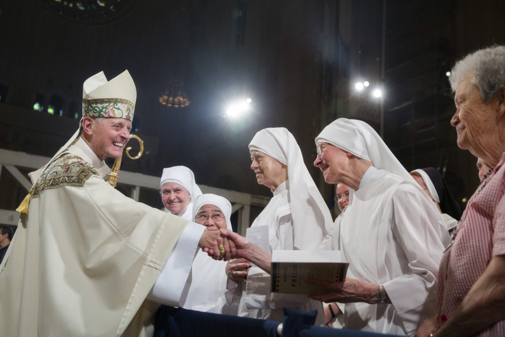 Cardinal Donald W. Wuerl of Washington greets members of the Little Sisters of the Poor July 4 after the closing Mass of the Fortnight for Freedom at the Basilica of the National Shrine of the Immaculate Conception in Washington. (CNS photo/Jaclyn Lippelmann, Catholic Standard) 