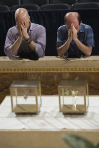 People venerate relics of Sts. Thomas More and John Fisher after the Fortnight for Freedom closing Mass July 4 at the Basilica of the National Shrine of the Immaculate Conception in Washington. (CNS photo/Jaclyn Lippelmann, Catholic Standard) 