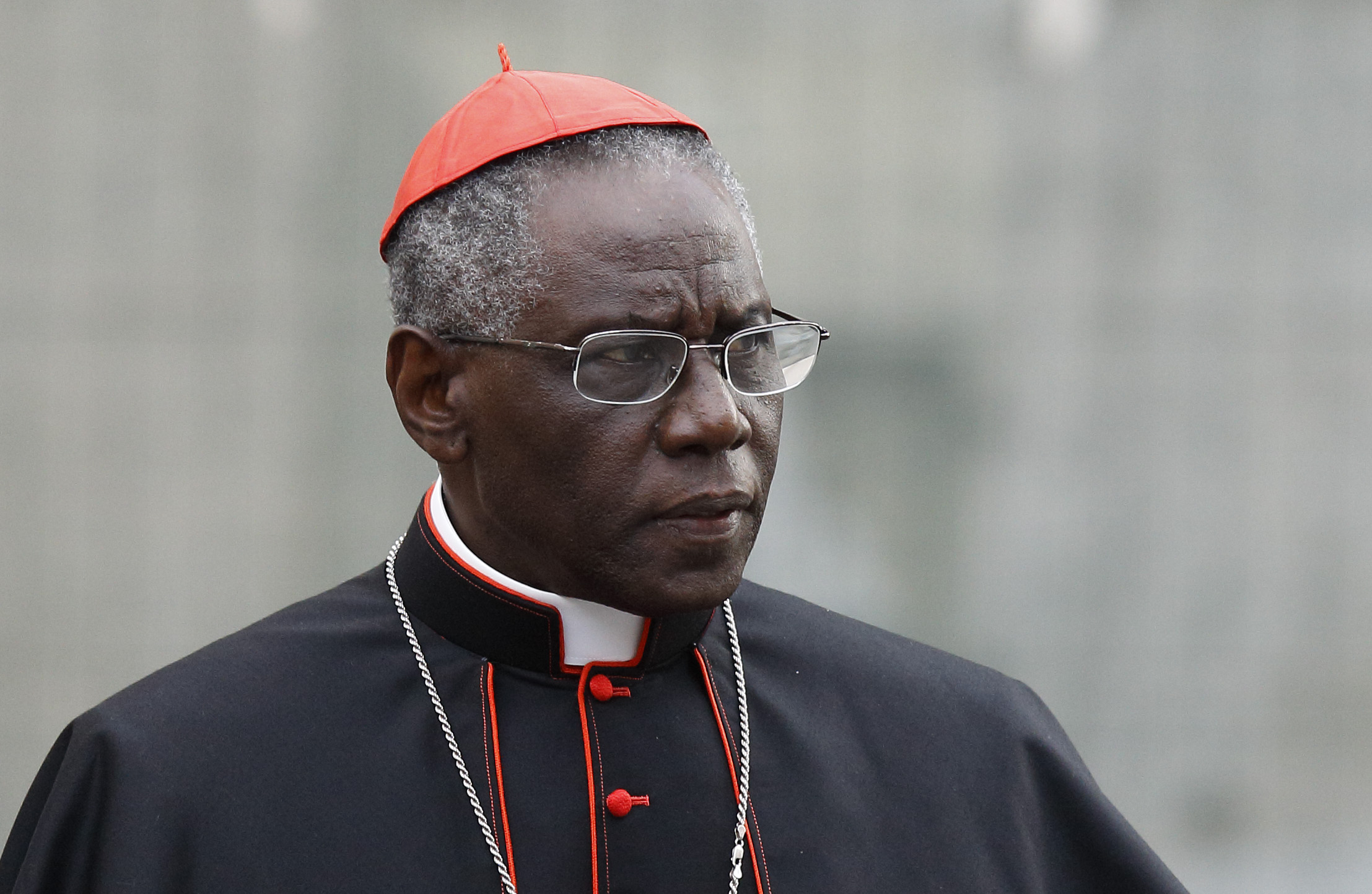 Cardinal Robert Sarah, prefect of the Congregation for Divine Worship and the Sacraments, is pictured at the Vatican in this Oct. 9, 2012, file photo. Cardinal Sarah, the Vatican's liturgy chief, has asked priests to begin celebrating the Eucharist facing east, the same direction the congregation faces. Although not commonplace, the practice is already permitted by church law. Cardinal Sarah made his request during a speech at the Sacra Liturgia conference in London July 5. (CNS photo/Paul Haring)