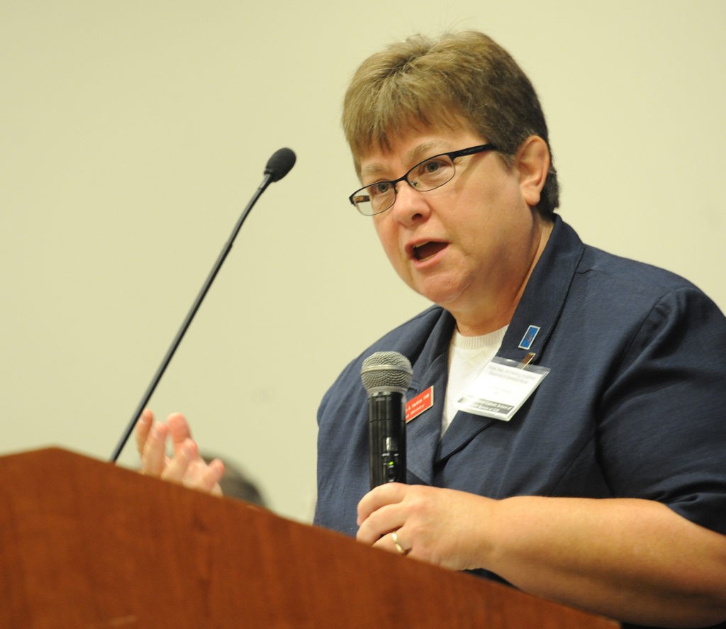 Sister Ruth Harkins, associate campus minister for graduate and professional students at The Catholic University of America in Washington, speaks at the university July 7 during a national symposium on domestic violence. (CNS photo/Dana Rene Bowler, CUA) 