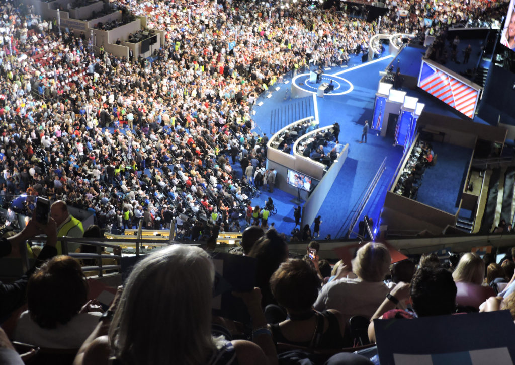 Delegates to the Democratic National Convention and other attendees can be seen July 26 at the Wells Fargo Center in Philadelphia. A Jesuit priest led the delegates in prayer the following day. (CNS photo/Elizabeth Evans) 