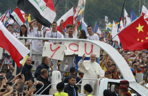 Pope Francis greets the crowd as he arrives to attend the World Youth Day welcoming ceremony in Blonia Park in Krakow, Poland, July 28. (CNS photo/Paul Haring) 