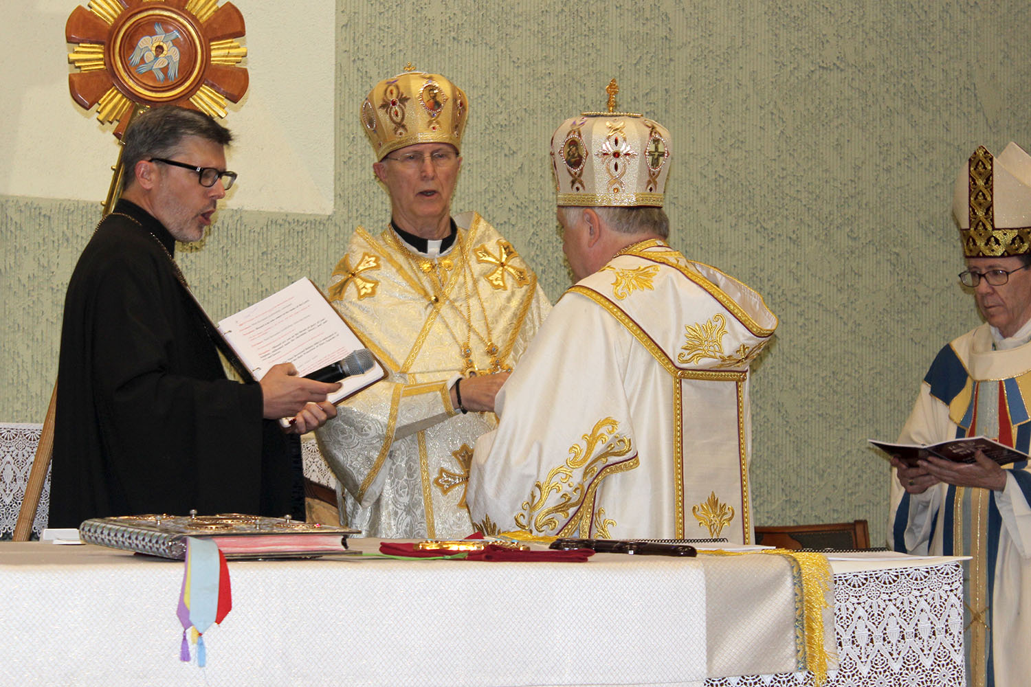 Bishop John Pazak is enthroned as the fifth bishop of the Holy Protection of Mary Byzantine Eparchy of Phoenix by Metropolitan Archbishop William C. Skurla at St. Helen Roman Catholic Parish July 20. (Photo courtesy of Kathleen Slonka, Eparchy of Phoenix)