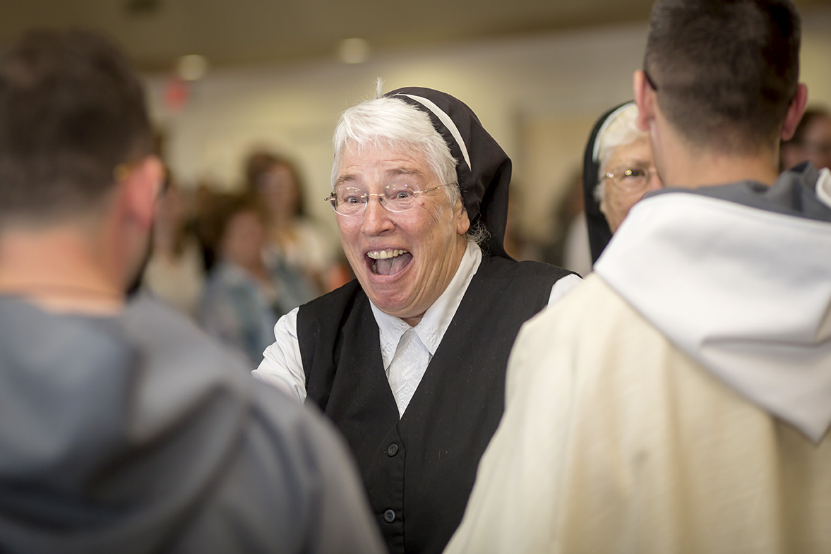 The Friars are congratulated by the Franciscan Sister of Christian Charity, a group of nuns in the Franciscan tradition who also serve the Native American communities in the diocese at St. Peter School in Bapchule. (Billy Hardiman/CATHOLIC SUN)