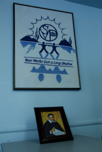 Some of the wall and table decorations in the intake area of the St. Vincent de Paul conference at Ss. Simon and Jude Cathedral reminds volunteers and guests why they're there. (Ambria Hammel/CATHOLIC SUN)