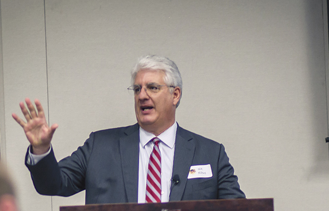 Nikolas Nikas, seen here delivering teh keynote address at a luncheon June 30, relies on his Catholic faith as he travels teh world representing the Bioethics Defense Fund. (Billy Hardiman/CATHOLIC SUN)