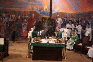 Dcn. Frank Cicero incenses Bishop Olmsted shortly after his ordination on Father's Day. The seminarian is one year away from priesthood. (photo courtesy of St. Timothy Parish)