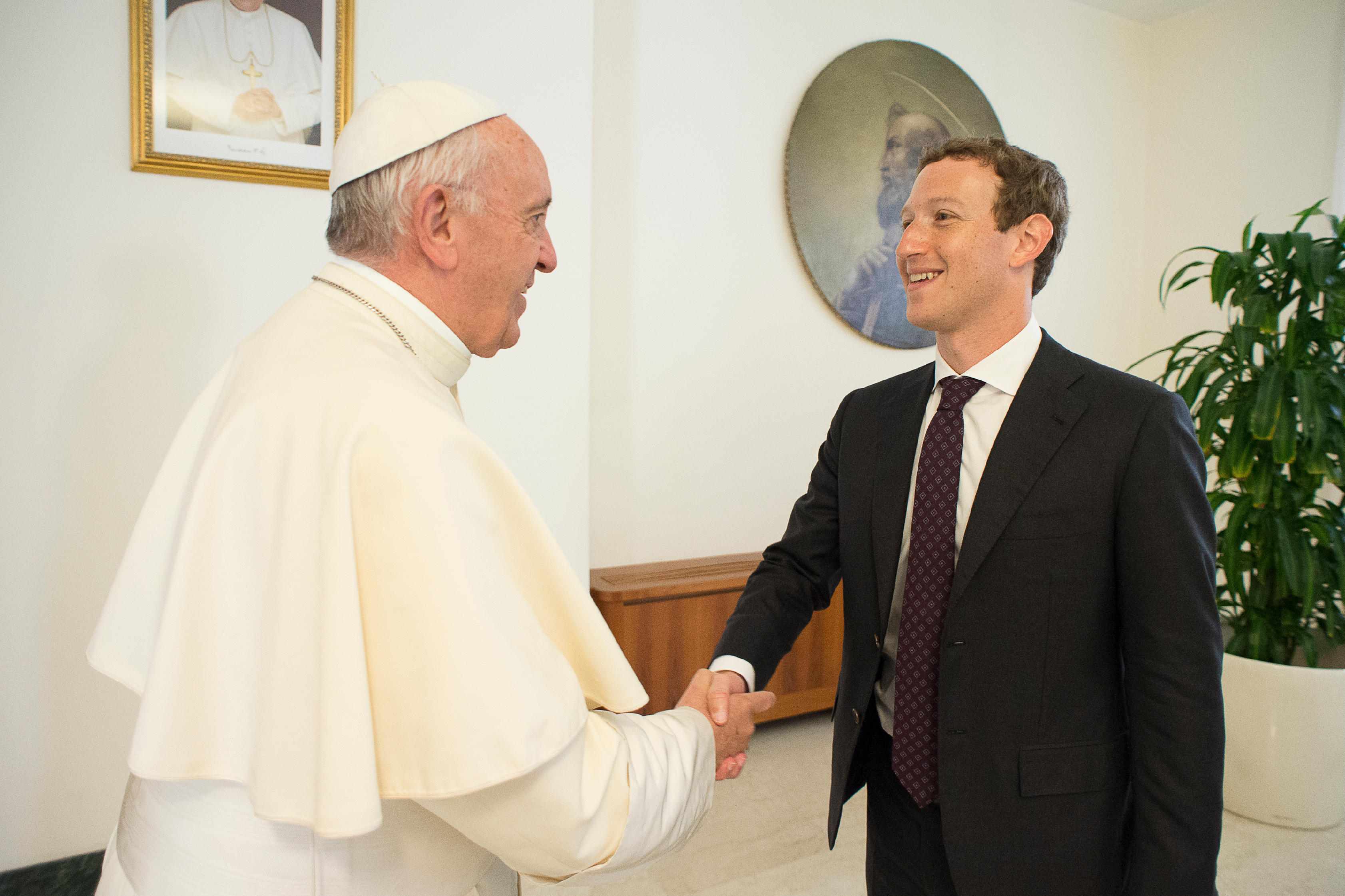 Pope Francis meets Mark Zuckerberg, CEO of Facebook, during a private audience at the Vatican Aug. 29. (CNS photo/L'Osservatore Romano, handout)