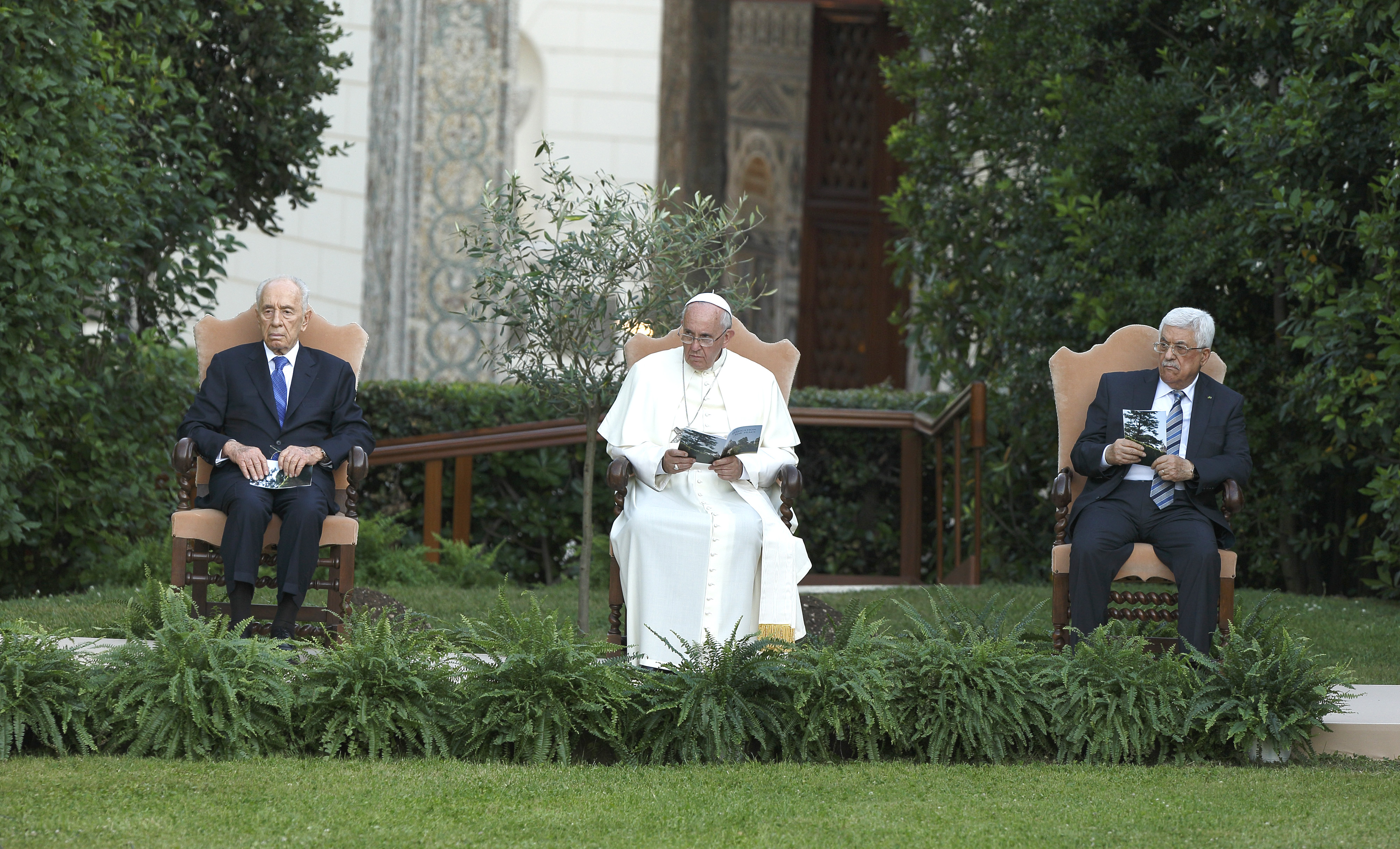 Israeli President Shimon Peres, Pope Francis and Palestinian President Mahmoud Abbas attend an invocation for peace in the Vatican Gardens in this June 8, 2014 file photo. (CNS photo/Paul Haring)