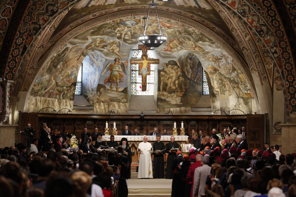 Pope Francis presides at an ecumenical prayer service with religious leaders in the Basilica of St. Francis in Assisi, Italy, Sept. 20. The pope and other religious leaders participated in the service that marked the 30th anniversary of St. John Paul II's Assisi interfaith peace gathering. (CNS photo/Paul Haring)