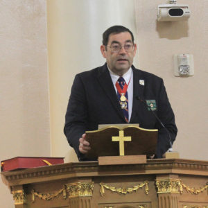 Sean Halpain, state deputy for the Knights of Columbus Arizona State Council, reads the general intercessions during the Sept. 17 liturgy. The state council co-sponsored the event and helped pay for the publication of the fourth edition of Bishop Olmsted’s booklet, “Catholics in the Public Square.” (Tony Gutiérrez/CATHOLIC SUN)