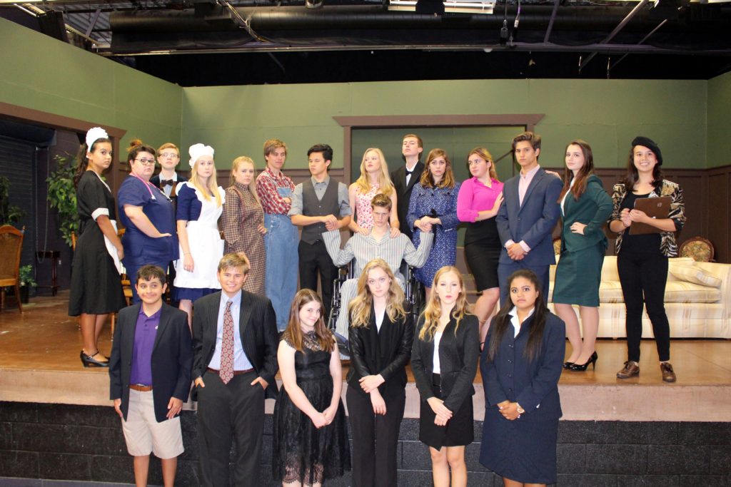 Actors, including the servers, of Notre Dame Preparatory's latest who-dunnit dinner theater production, pose for a photo. Shows run Oct. 12 and Oct. 15.