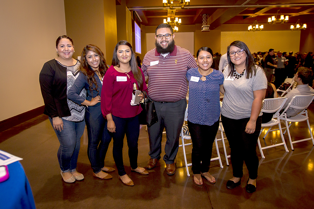 A group from St. Anthony Parish poses during the Young Catholic Professionals launch at St. Francis Xavier Parish Aug. 23. (Billy Hardiman/CATHOLIC SUN)