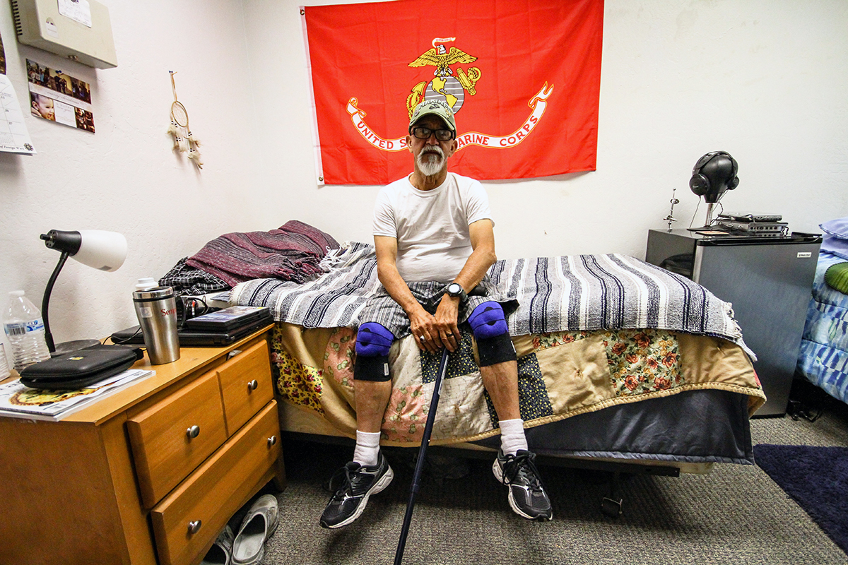 A veteran in his room at the MANA (Marines, Army, Navy, Air Force) House, a transitional living center run by Catholic Charities in central Phoenix. MANA House helps veterans experiencing homelessness. (Photo courtesy of Catholic Charities Community Services)