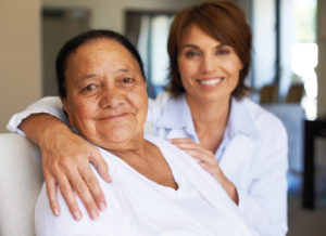 A senior woman sits with her doctor. The Foundation for Senior Living can help provide home health care services and resources to help individuals age in place. (courtesy photo)