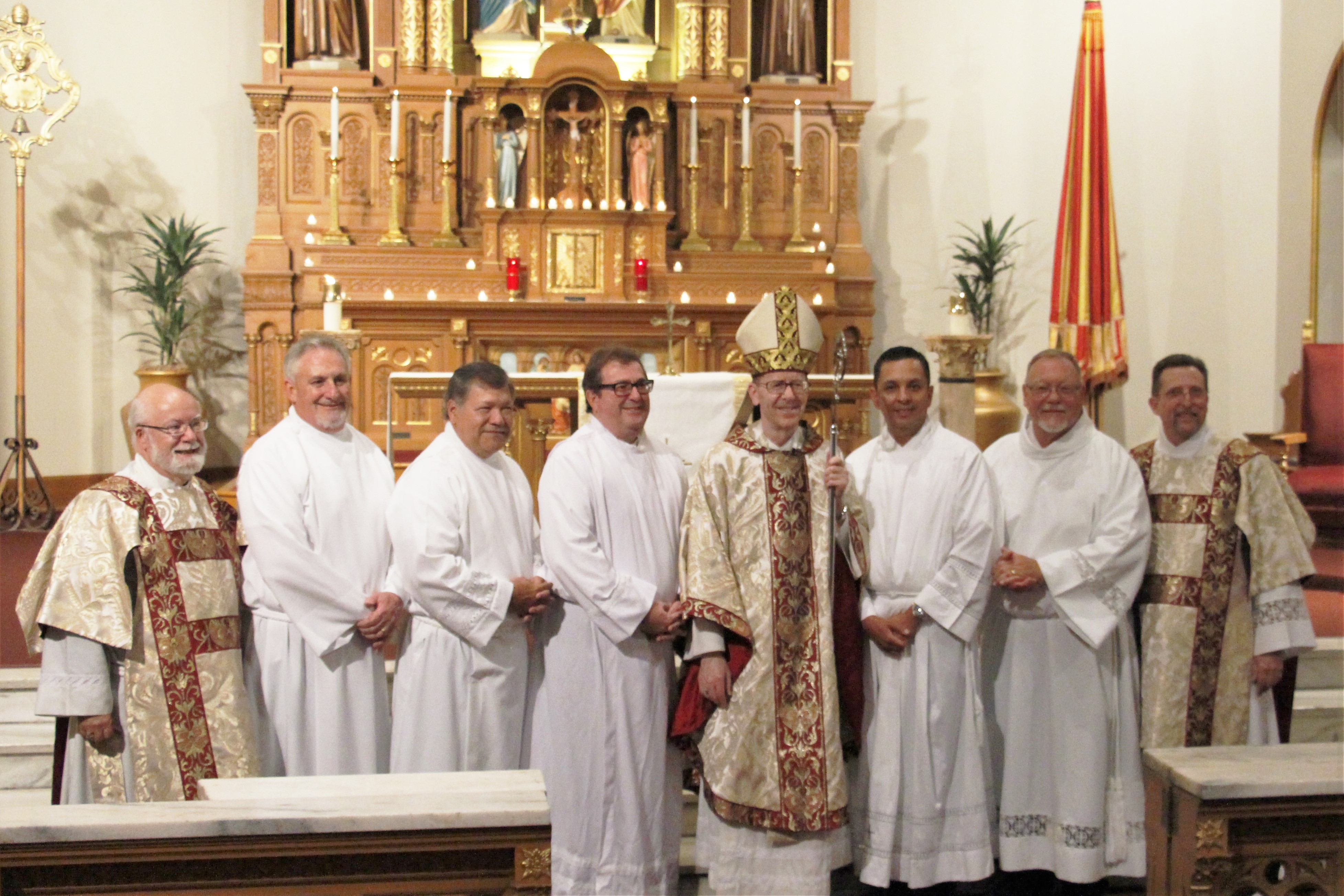Bishop Thomas J. Olmsted will ordain five men to the permanent diaconate Nov. 5. The five men are pictured with Bishop Olmsted (center), director of the diocesan Office of the Permanent Diaconate Dcn. Jim Trant (far left) and associate director Dcn. Doug Bogart (far right) shortly after they were instituted to as acolytes on Aug. 28, 2015 at Ss. Simon and Jude Cathedral. The candidates are, from left to right: Anthony Smith, Marvin Silva, Gary Scott, William Chavira and Chris Giannola. (Photo courtesy of the Office of the Permanent Diaconate)