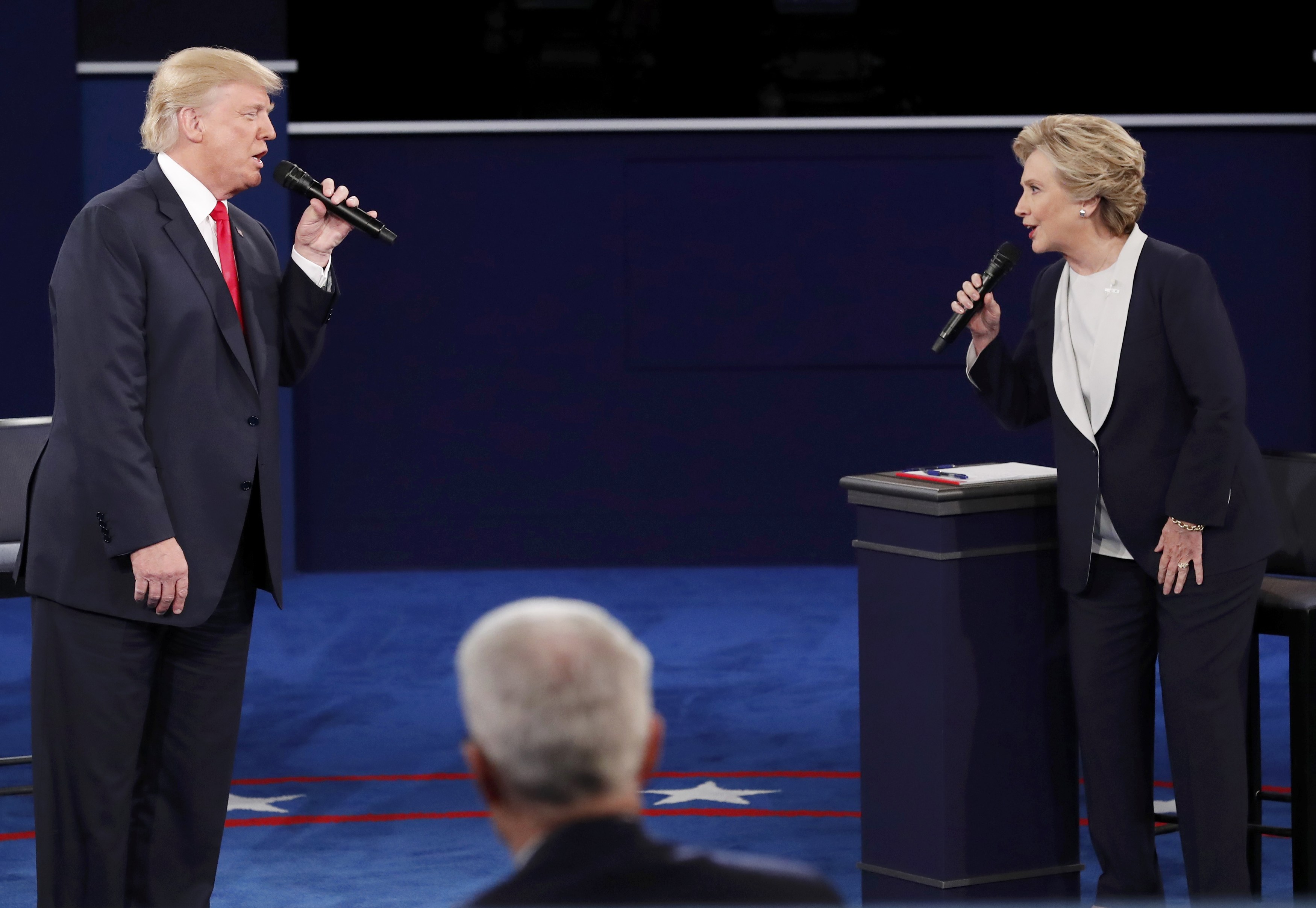 Republican U.S. presidential nominee Donald Trump and Democratic presidential nominee Hillary Clinton speak during their Oct. 9 presidential town hall debate at Washington University in St. Louis. (CNS photo/Jim Young, Reuters)