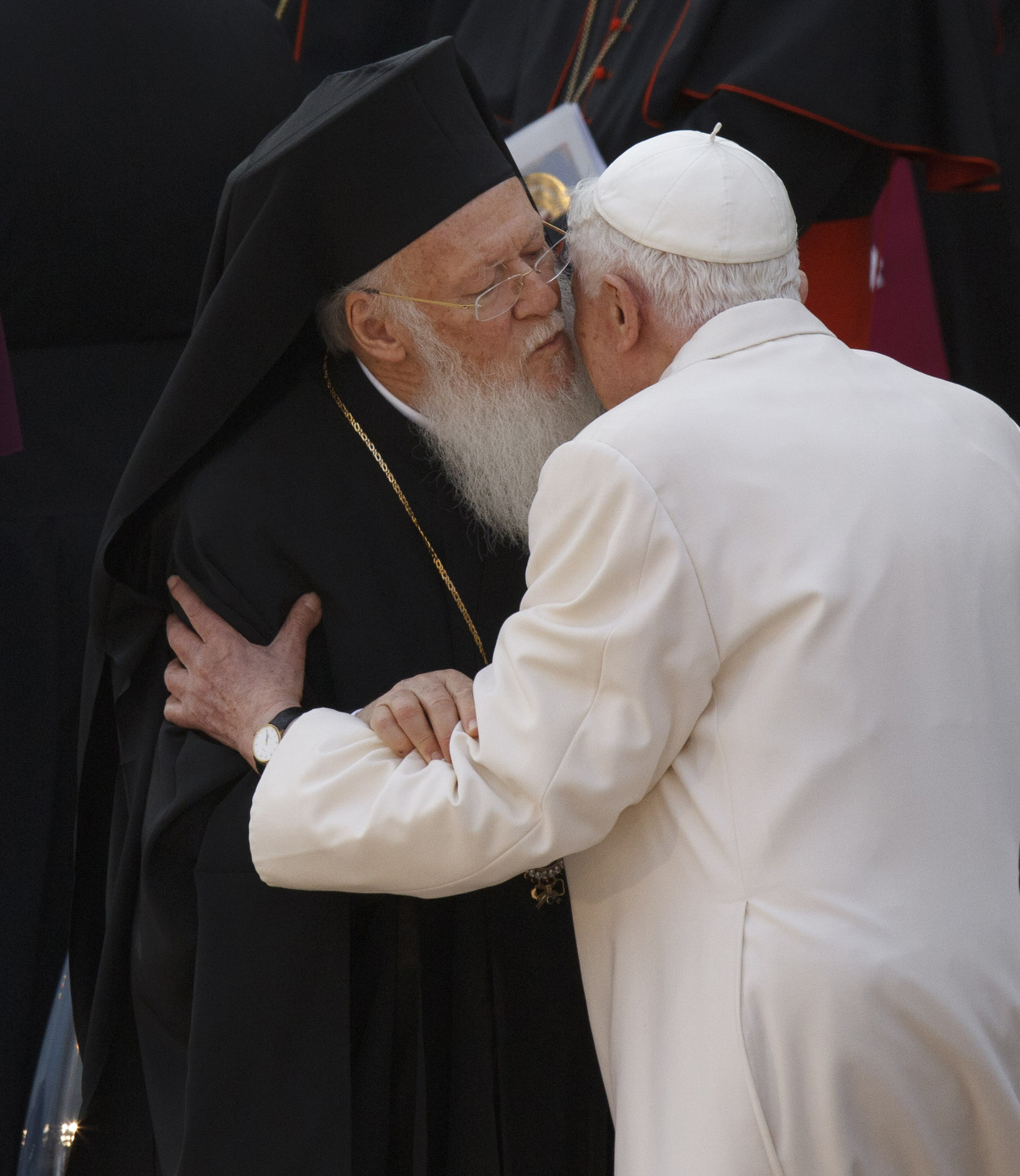 Ecumenical Patriarch Bartholomew of Constantinople and Pope Benedict XVI embrace during a 2011 interfaith meeting for peace outside the Basilica of St. Francis in Assisi, Italy. (CNS photo/Paul Haring)
