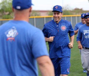Father Burke Masters, Chicago Cubs' chaplain, takes part in a practice with players during spring training in March 2016 at Sloan Park in Mesa, Ariz. Cubs Manager Joe Maddon invited Father Masters to practice with the team. (CNS photo/Ed Mailliard, courtesy Topps) 