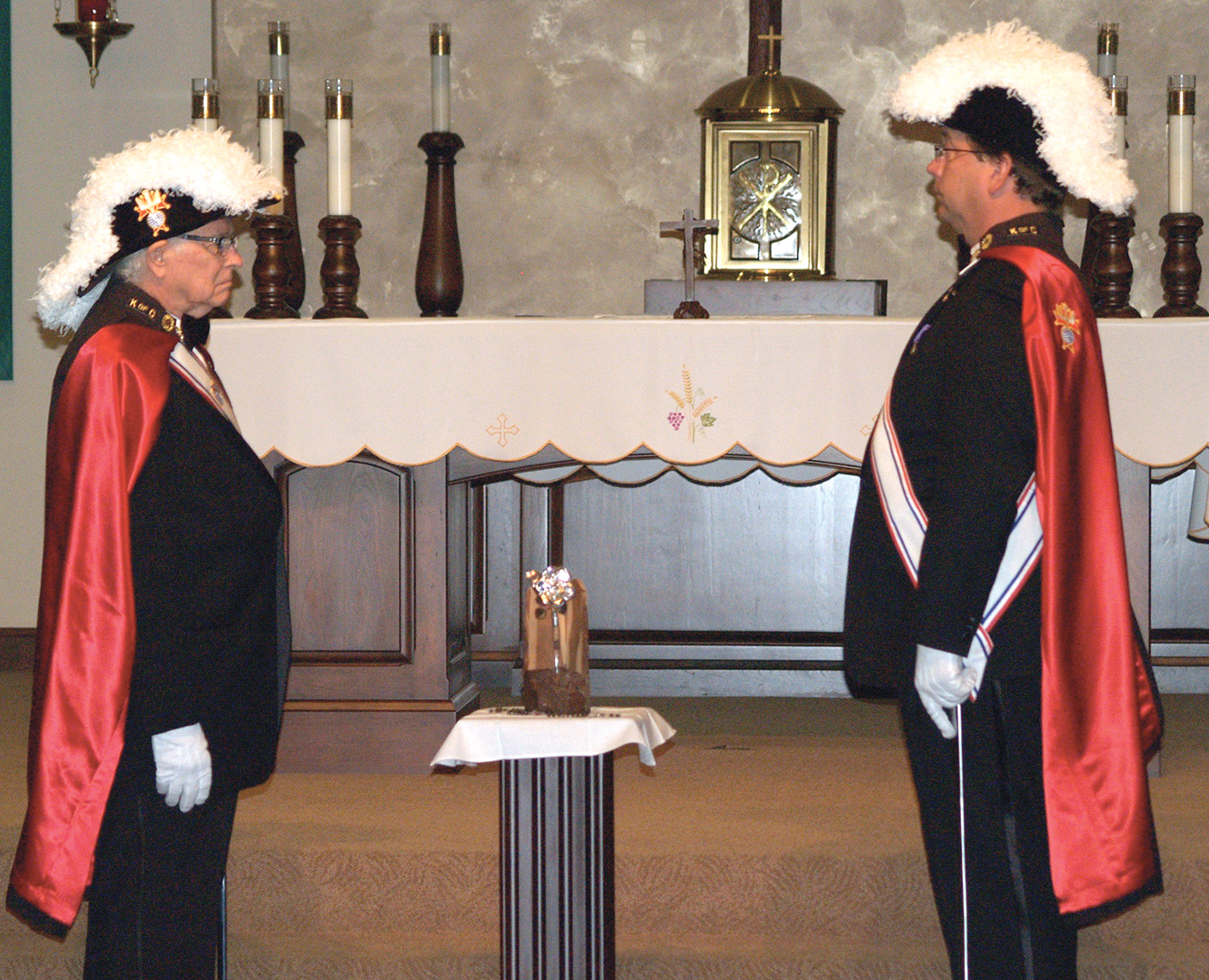 Members of a Knights of Columbus Fourth Degree honor guard stand guard next to the silver rose at St. Rose Philippine Duchesne Parish in Anthem Oct. 6. (Karen Mahoney/CATHOLIC SUN)