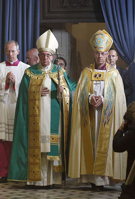 Pope Francis and Anglican Archbishop Justin Welby of Canterbury, England, spiritual leader of the Anglican Communion, arrive to preside at a vespers service at the Church of St. Gregory in Rome Oct. 5. (CNS photo/Paul Haring)