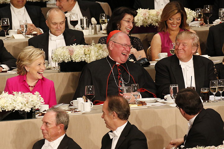 New York Cardinal Timothy M. Dolan shares a light moment with U.S. Democratic presidential nominee Hillary Clinton and Republican presidential nominee Donald Trump during the 71st annual Alfred E. Smith Memorial Foundation Dinner at the Waldorf Astoria hotel in New York City Oct. 20. The charity gala, which honors the memory of the former New York Democratic governor who was the first Catholic nominated by a major political party for the U.S. presidency, raises money to support not-for-profit organizations that serve children in need. (CNS photo/Gregory A. Shemitz)