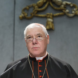 Cardinal Gerhard Müller, prefect of the Congregation for the Doctrine of the Faith, speaks at a Vatican news conference Oct. 25. Cardinal Muller said that while the Catholic Church continues to prefer burial in the ground, it accepts cremation as an option, but forbids the scattering of ashes or keeping cremated remains at home. (CNS photo/Paul Haring)