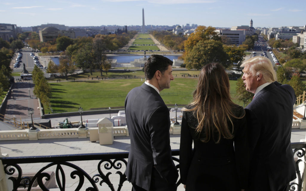 U.S. House Speaker Paul Ryan, R-Wis., shows Melania Trump and U.S. President-elect Donald Trump the Mall from his balcony on Capitol Hill in Washington Nov. 10. (CNS photo/Joshua Roberts, Reuters) 