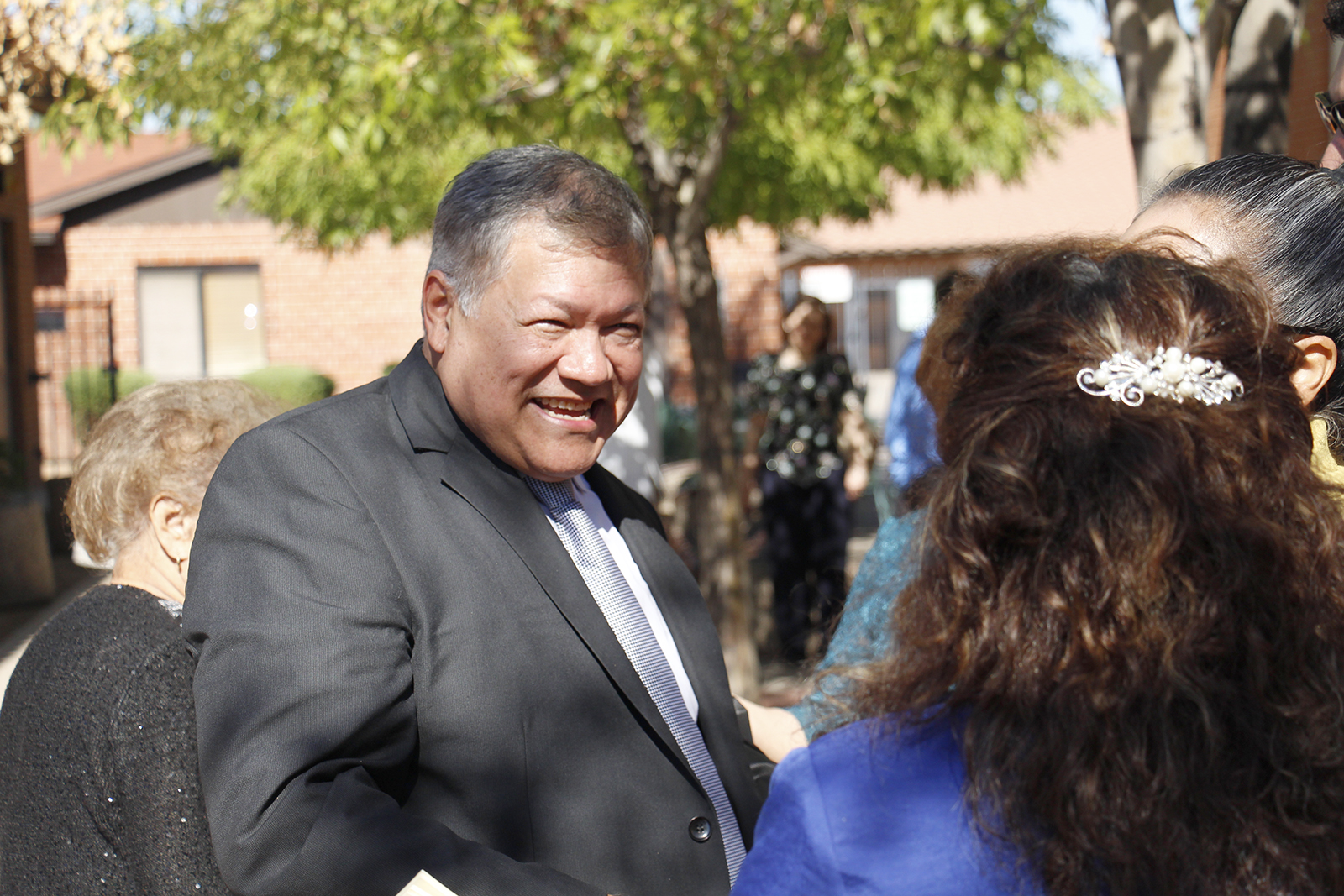 Dcn. Marvin Silva greets well-wishers following his ordination to the permanent diaconte Nov. 5 outside of Ss. Simon and Jude Cathedral. Dcn. Silva will be serving at St. Mary Parish in Chandler. (Ambria Hammel/CATHOLIC SUN)