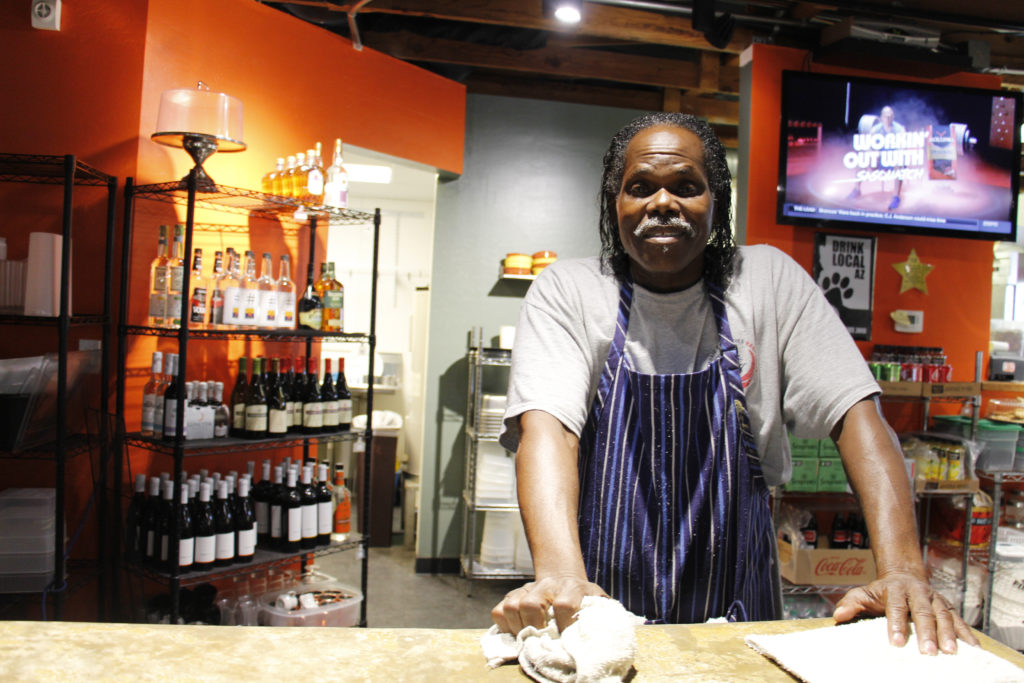 Saleto Henderson is one of 16 veterans projected to learn valuable work skills through a training program at The Refuge in 2016. He still works at the café and wine bar run by Catholic Charities. (Ambria Hammel/CATHOLIC SUN)