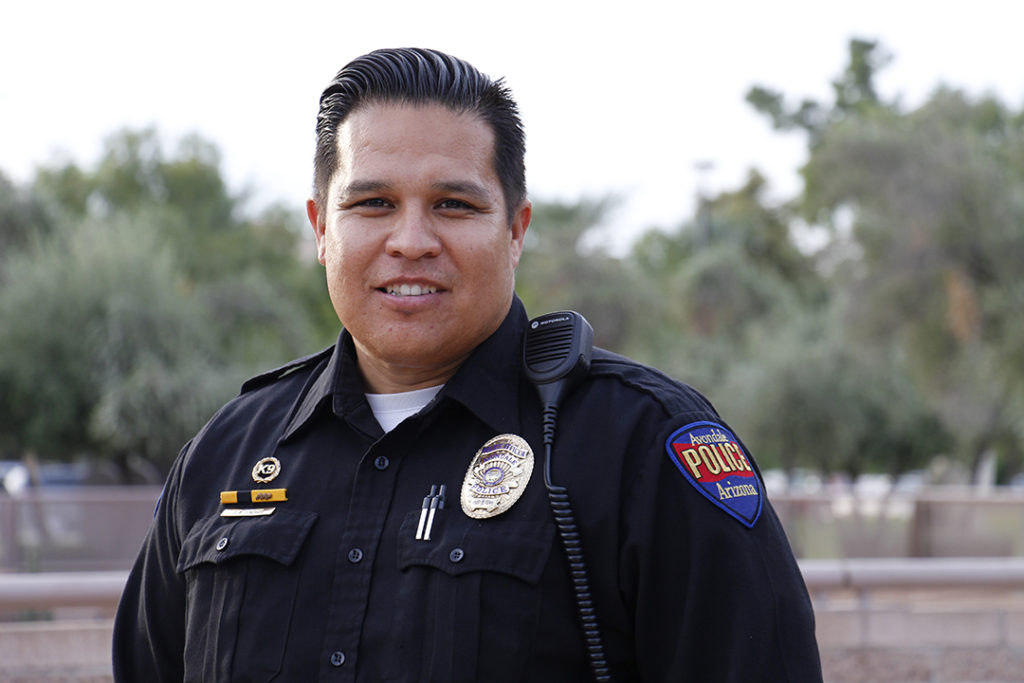 James Sinohui, a patrolman for Avondale Police, stands near the Arizona Peace Officers Memorial Oct. 27. Sinohui sees his profession as a way to bring Christ’s light to the world. He also protects the unborn via a new coffee company. (Ambria Hammel/CATHOLIC SUN)
