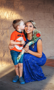 Ela Wootton receives a kiss from her brother, Ray, 3. (courtesy photo)