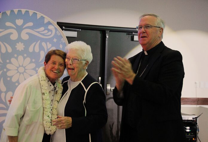 Sr Lynn Sr Joan bishop clapping